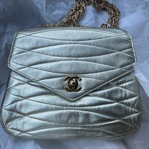 RARE CHANEL mini flap in metallic gold lambskin